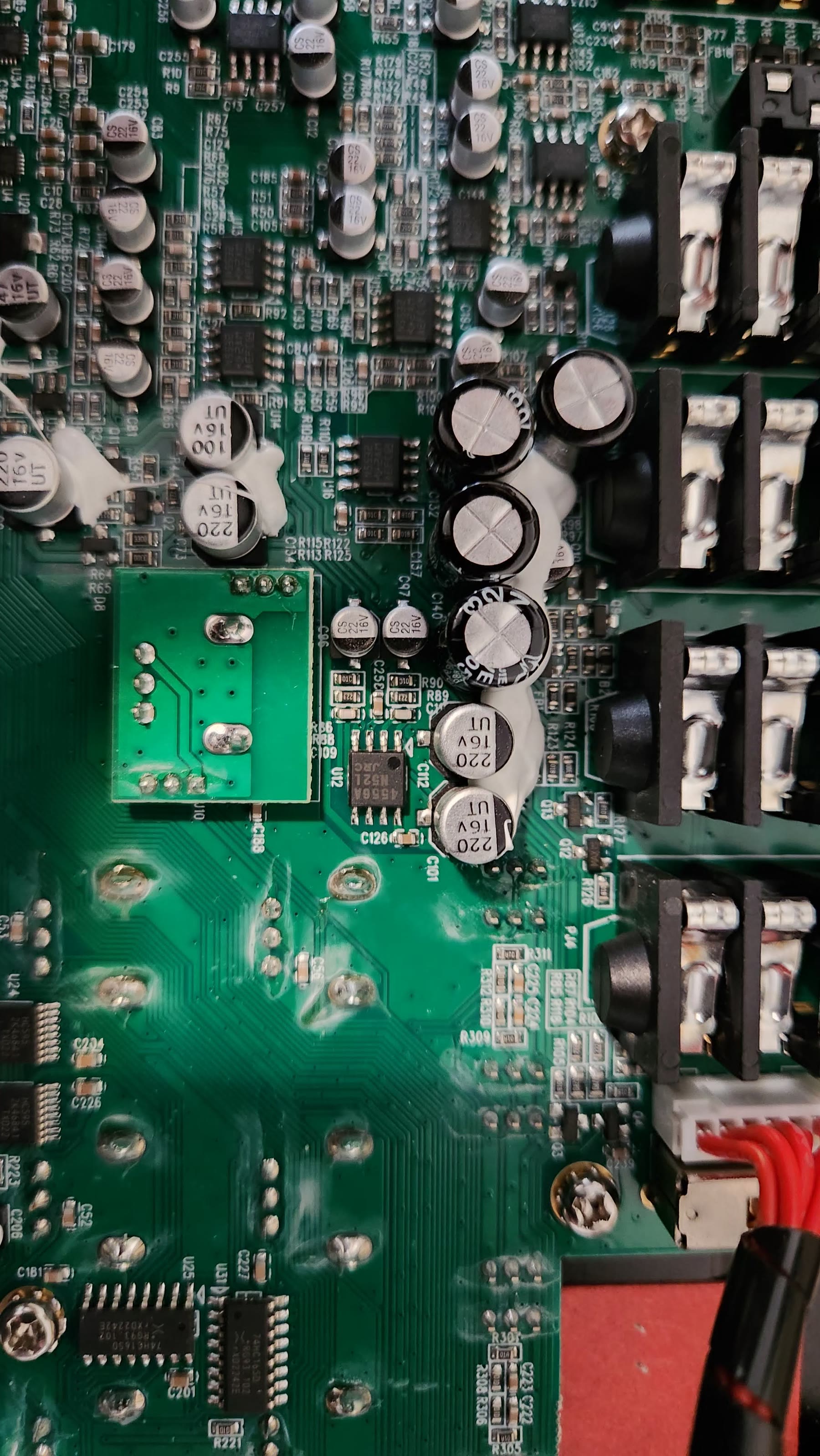 Mainboard section with front-panel rotary encoder terminals and logic shift registers