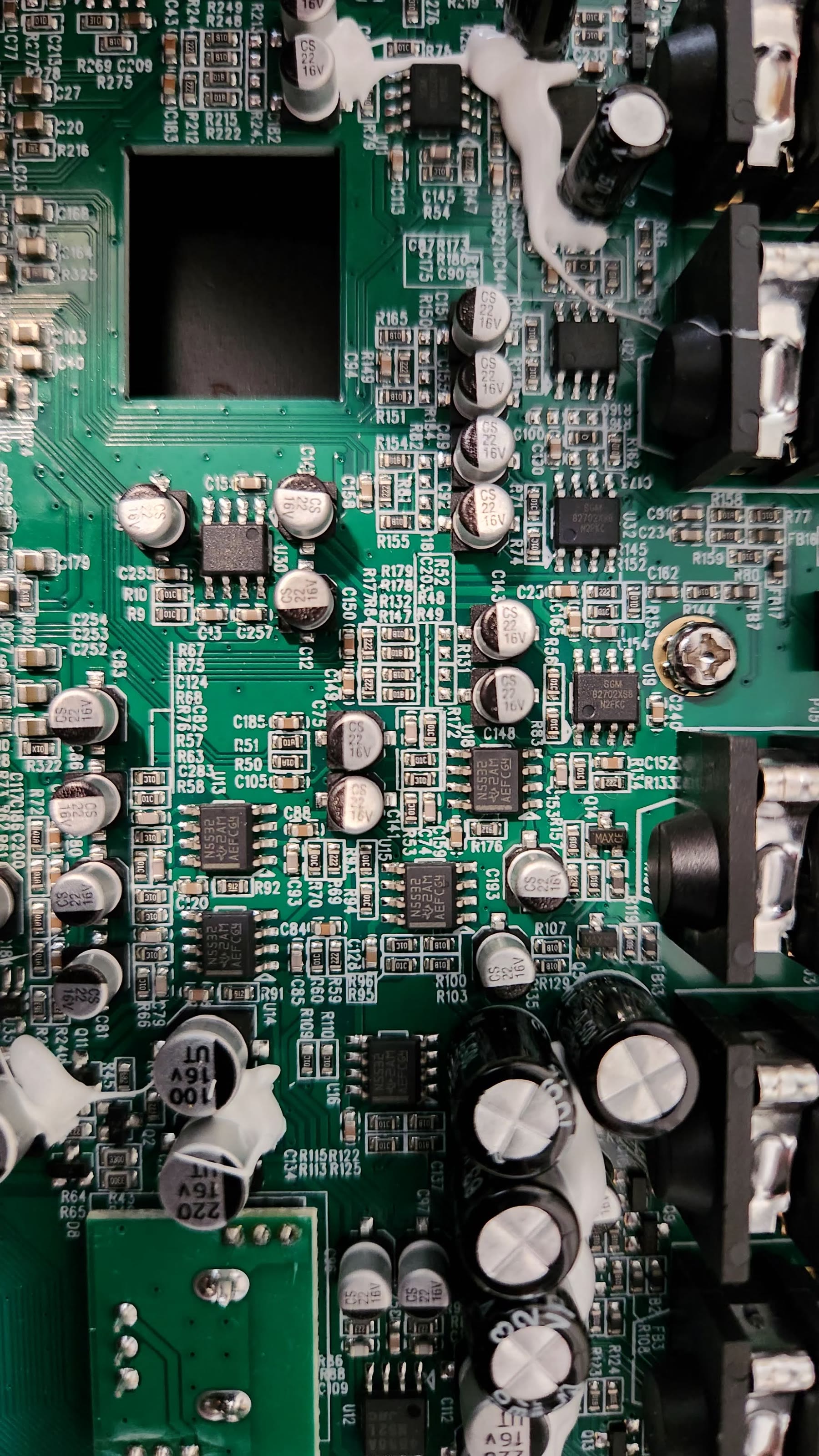 Reverse side of the optical sensor board with its emitter, detector, and ribbon connector