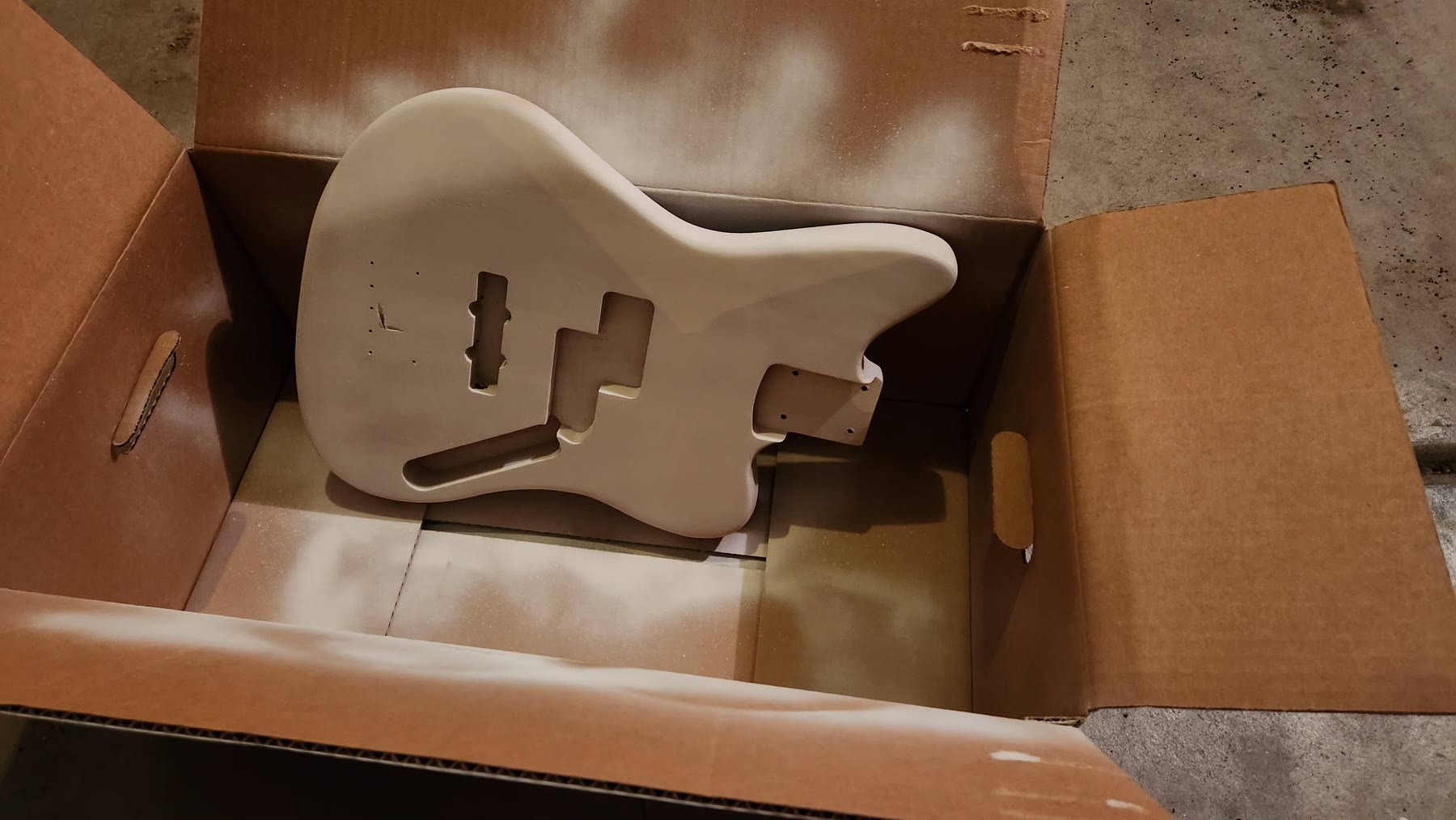 Bass body prepared with grey primer
